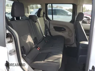 2016 Ford Transit Connect XLT with VIN NM0AE8F7XG1234396, listed as a Copart auction lot 83246404 with 82,787 mi miles and Salvage title. Bid and sale history available at DreamBid. Image 11.