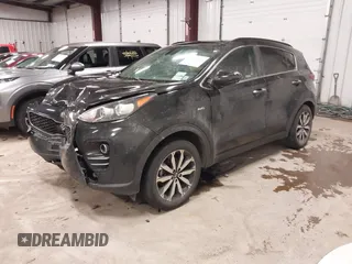 2019 Kia Sportage EX with VIN KNDPNCAC0K7606712, listed as a IAAI auction lot 41652131 with 71,013 mi miles. Bid and sale history available at carsss.com. Image 17.