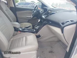 2014 Ford Escape Titanium с VIN 1FMCU0J91EUD93260, выставлен на аукционе IAAI как лот 42495051 с пробегом 97 164 миль миль и . История ставок и продаж доступна на DreamBid. Изображение 5.