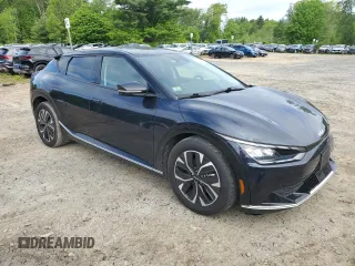 2024 Kia EV6 Wind z VIN KNDC3DLC6R5193465, wystawiony jako Copart lot #56941845 z przebiegiem 12 703 mil mil oraz Nie do naprawy • Non repairable. Historia ofert i sprzedaży dostępna na DreamBid. Obrazek 4.