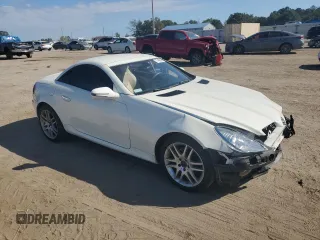 2009 Mercedes-Benz SLK-Class 3.0L with VIN WDBWK54F79F209339, listed as a Copart auction lot 77400294 with 68,540 mi miles and Salvage Title. Bid and sale history available at carsss.com. Image 4.