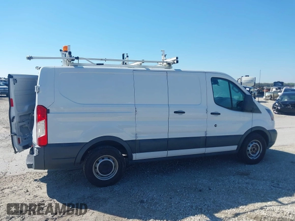 2018 Ford Transit with VIN 1FTYE1ZM0JKA39340, listed as a IAAI auction lot 41483588 with 91,512 mi miles and . Bid and sale history available at DreamBid. Image 13.