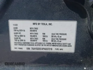 2023 Tesla Model Y Long Range with VIN 7SAYGDEE4PA037218, listed as a IAAI auction lot 42232704 with 18,756 mi miles and . Bid and sale history available at DreamBid. Image 9.