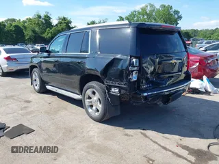 2015 Chevrolet Tahoe LTZ z VIN 1GNSKCKC3FR104845, wystawiony jako IAAI lot #42291785 z przebiegiem 75 047 mil mil oraz . Historia ofert i sprzedaży dostępna na DreamBid. Obrazek 3.