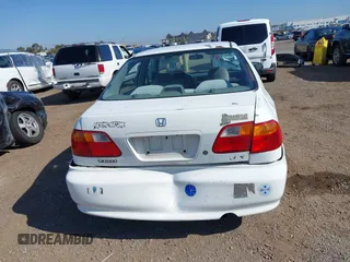 2000 Honda Civic LX with VIN 2HGEJ6673YH502410, listed as a IAAI auction lot 41992745 with 173,958 mi miles. Bid and sale history available at carsss.com. Image 16.
