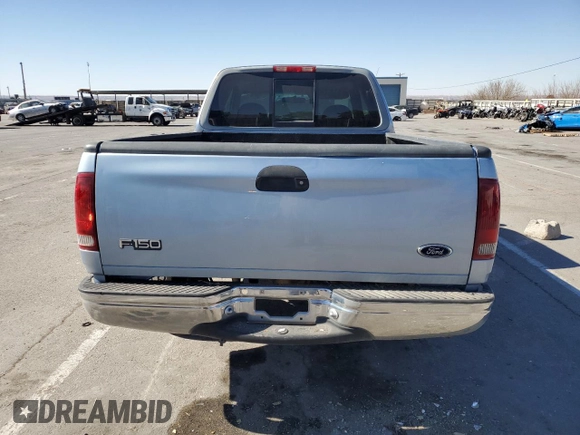 1998 Ford F-150 with VIN 1FTDX1725WKA02303, listed as a Copart auction lot 43471005 with 89,812 mi miles and Salvage title. Bid and sale history available at DreamBid. Image 6.