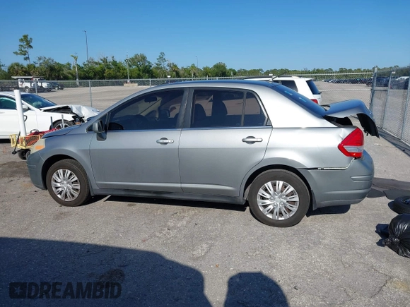 2009 Nissan Versa 1.8 S with VIN 3N1BC11E09L377706, listed as a IAAI auction lot 42027981 with 146,105 mi miles. Bid and sale history available at carsss.com. Image 14.