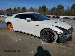 2018 Nissan GT-R Premium с VIN JN1AR5EF9JM710421, выставлен на аукционе Copart как лот 84895244 с пробегом 27 217 миль миль и Списание • Salvage title. История ставок и продаж доступна на DreamBid. Изображение 4.