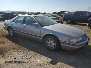1997 Cadillac Seville Luxury SLS with VIN 1G6KS52Y0VU801906, listed as a Copart auction lot 65169364 with 191,627 mi miles and Salvage Title. Bid and sale history available at carsss.com. Image 4.
