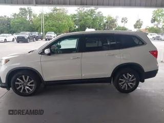2019 Honda Pilot EX-L with VIN 5FNYF6H57KB011649, listed as a IAAI auction lot 41880951 with 99,504 mi miles. Bid and sale history available at carsss.com. Image 14.