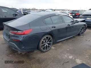 2021 BMW 8 Series M850i with VIN WBAGV8C03MCG68700, listed as a IAAI auction lot 41684696 with 18,516 mi miles. Bid and sale history available at carsss.com. Image 4.