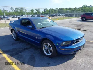 2006 Ford Mustang Standard with VIN 1ZVFT80N565167331, listed as a IAAI auction lot 42162547 with 113,035 mi miles. Bid and sale history available at carsss.com. Image 1.