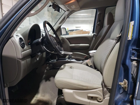 2005 Jeep Liberty Sport with VIN 1J4GL48K55W555396, listed as a Copart auction lot 52388185 with 50,253 mi miles and Salvage Title. Bid and sale history available at carsss.com. Image 7.