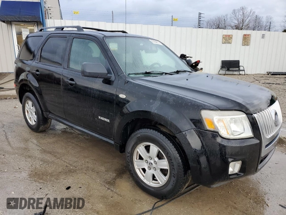 2008 Mercury Mariner z VIN 4M2CU81Z98KJ39101, wystawiony jako Copart lot #85359614 z przebiegiem 215 565 mil mil oraz Szkoda całkowita • Salvage title. Historia ofert i sprzedaży dostępna na DreamBid. Obrazek 4.