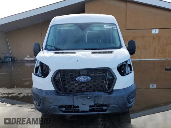 2021 Ford Transit Cargo with VIN 1FTBR1CG7MKA88875, listed as a Copart auction lot 84705324 with 23,654 mi miles and Salvage Title. Bid and sale history available at DreamBid. Image 5.