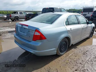 2011 Ford Fusion Hybrid z VIN 3FADP0L30BR123857, wystawiony jako IAAI lot #42534556 z przebiegiem 144 811 mil mil oraz . Historia ofert i sprzedaży dostępna na DreamBid. Obrazek 4.