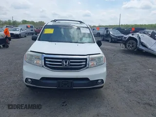2014 Honda Pilot EX-L with VIN 5FNYF3H50EB005811, listed as a IAAI auction lot 42115804 with 216,033 mi miles and . Bid and sale history available at DreamBid. Image 12.