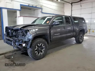 2021 Toyota Tacoma SR z VIN 3TYSZ5AN2MT009070, wystawiony jako Copart lot #49614855 z przebiegiem 87 492 mil mil oraz Szkoda całkowita • Salvage title. Historia ofert i sprzedaży dostępna na DreamBid. Obrazek 1.