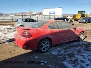 1999 Pontiac Grand Am GT with VIN 1G2NW12E4XM873986, listed as a Copart auction lot 42249455 with 0 mi miles and Clean Title. Bid and sale history available at carsss.com. Image 3.