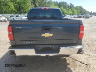 2018 Chevrolet Silverado 1500 LT with VIN 3GCPCREC1JG519228, listed as a Copart auction lot 52293035 with 102,436 mi miles and Salvage Title. Bid and sale history available at DreamBid. Image 6.