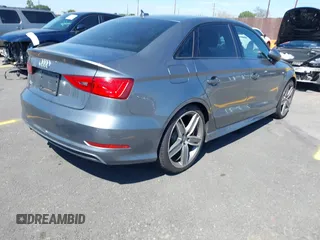 2016 Audi A3 Premium z VIN WAUA7GFF4G1051667, wystawiony jako IAAI lot #41945674 z przebiegiem 101 648 mil mil oraz . Historia ofert i sprzedaży dostępna na DreamBid. Obrazek 4.