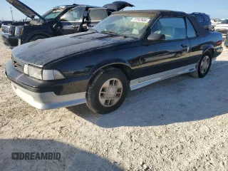 1989 Chevrolet Cavalier with VIN 1G1JF31W1K7190840, listed as a Copart auction lot 77747934 with Not Provided miles and Salvage Title. Bid and sale history available at DreamBid. Image 1.