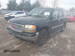 2005 GMC Yukon SLT with VIN 1GKEK13Z45R270890, listed as a IAAI auction lot 41606845 with 233,652 mi miles. Bid and sale history available at carsss.com. Image 2.