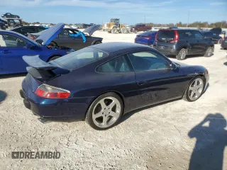 2000 Porsche 911 z VIN WP0AA2996YS621130, wystawiony jako Copart lot #77096434 z przebiegiem Nie podano mil oraz Szkoda całkowita • Salvage title. Historia ofert i sprzedaży dostępna na DreamBid. Obrazek 3.