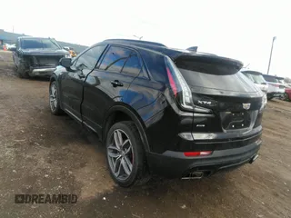 2021 Cadillac XT4 AWD Sport with VIN 1GYFZFR48MF009552, listed as a IAAI auction lot 41743125 with 53,982 mi miles and . Bid and sale history available at DreamBid. Image 3.
