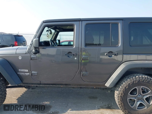 2018 Jeep Wrangler Unlimited Sport S with VIN 1C4BJWDG6JL854359, listed as a IAAI auction lot 42423170 with 84,470 mi miles and . Bid and sale history available at DreamBid. Image 15.
