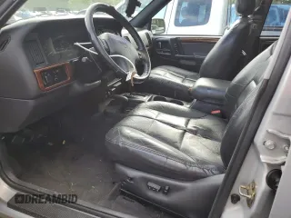 1998 Jeep Grand Cherokee Limited с VIN 1J4GZ78Y0WC245194, выставлен на аукционе Copart как лот 57838825 с пробегом 199 412 миль миль и Списание • Salvage title. История ставок и продаж доступна на DreamBid. Изображение 7.