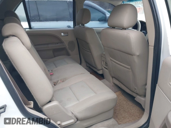 2005 Ford Freestyle SEL z VIN 1FMZK02115GA77767, wystawiony jako IAAI lot #41717441 z przebiegiem 149 309 mil mil oraz . Historia ofert i sprzedaży dostępna na DreamBid. Obrazek 8.
