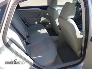 2014 Volkswagen Passat Wolfsburg Edition with VIN 1VWAT7A30EC084532, listed as a IAAI auction lot 42301251 with 81,963 mi miles and . Bid and sale history available at DreamBid. Image 8.