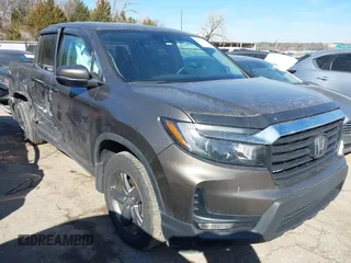 2022 Honda Ridgeline RTL z VIN 5FPYK3F50NB000453, wystawiony jako IAAI lot #41661813 z przebiegiem 43 691 mil mil oraz . Historia ofert i sprzedaży dostępna na DreamBid. Obrazek 1.