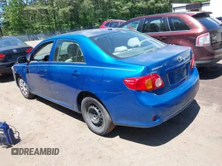 2009 Toyota Corolla with VIN 2T1BU40E69C167904, listed as a IAAI auction lot 42206415 with 201,694 mi miles. Bid and sale history available at carsss.com. Image 3.