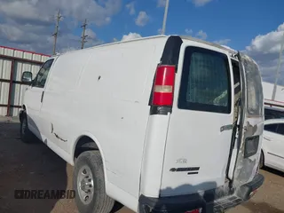 2013 Chevrolet Express Cargo with VIN 1GCWGFBA6D1185850, listed as a IAAI auction lot 40965967 with 165,641 mi miles and . Bid and sale history available at DreamBid. Image 3.