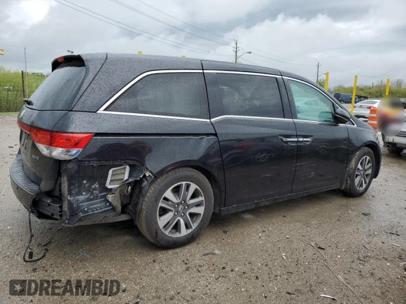 2014 Honda Odyssey Touring z VIN 5FNRL5H91EB063390, wystawiony jako Copart lot #54482545 z przebiegiem Nie podano mil oraz Szkoda całkowita • Salvage title. Historia ofert i sprzedaży dostępna na DreamBid. Obrazek 3.