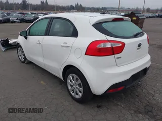 2013 Kia Rio LX with VIN KNADM5A34D6110013, listed as a IAAI auction lot 41306019 with 80,501 mi miles and . Bid and sale history available at DreamBid. Image 3.