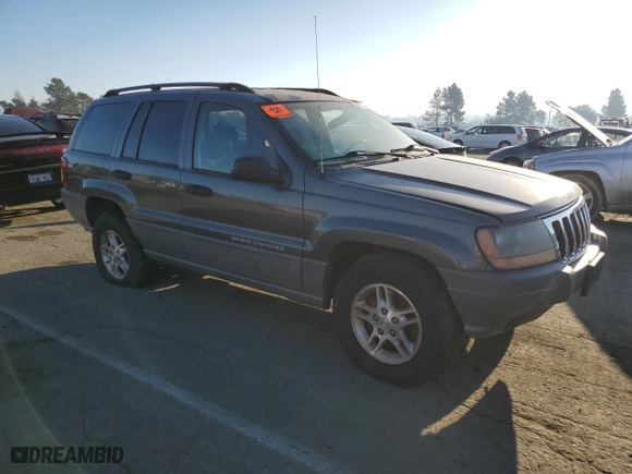 2002 Jeep Grand Cherokee Laredo with VIN 1J4GW48N32C200645, listed as a Copart auction lot 88174715 with 112,129 mi miles and Clean Title. Bid and sale history available at carsss.com. Image 4.