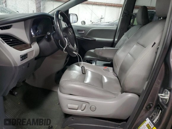 2015 Toyota Sienna XLE с VIN 5TDYK3DC4FS650605, выставлен на аукционе Copart как лот 58217575 с пробегом 174 364 миль миль и Списание • Salvage title. История ставок и продаж доступна на DreamBid. Изображение 7.