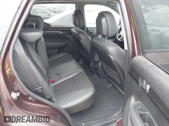 2012 Kia Sorento EX z VIN 5XYKU3A63CG306285, wystawiony jako IAAI lot #42166617 z przebiegiem 215 132 mil mil oraz . Historia ofert i sprzedaży dostępna na DreamBid. Obrazek 8.