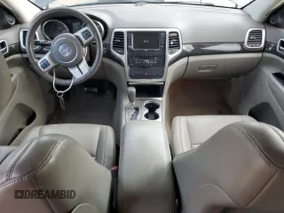 2011 Jeep Grand Cherokee Laredo with VIN 1J4RR4GG1BC610654, listed as a Copart auction lot 58828015 with 155,959 mi miles and Salvage title. Bid and sale history available at DreamBid. Image 8.