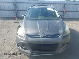 2013 Ford Escape Titanium with VIN 1FMCU0J92DUB36428, listed as a IAAI auction lot 42144682 with 263,600 mi miles and . Bid and sale history available at carsss.com. Image 13.
