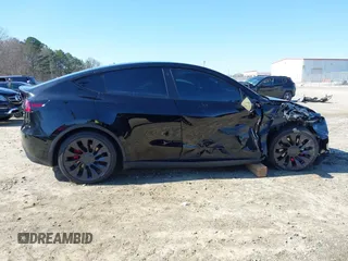 2021 Tesla Model Y Performance with VIN 5YJYGDEF6MF252877, listed as a IAAI auction lot 41770770 with 58,550 mi miles and . Bid and sale history available at DreamBid. Image 13.