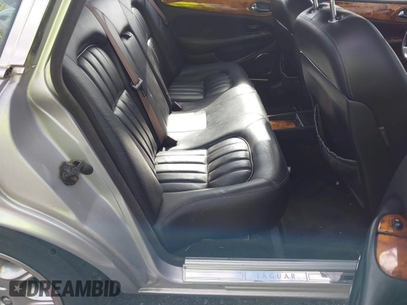 2000 Jaguar XJ with VIN SAJDA14C4YLF13470, listed as a IAAI auction lot 42136313 with 237,063 mi miles and . Bid and sale history available at DreamBid. Image 8.