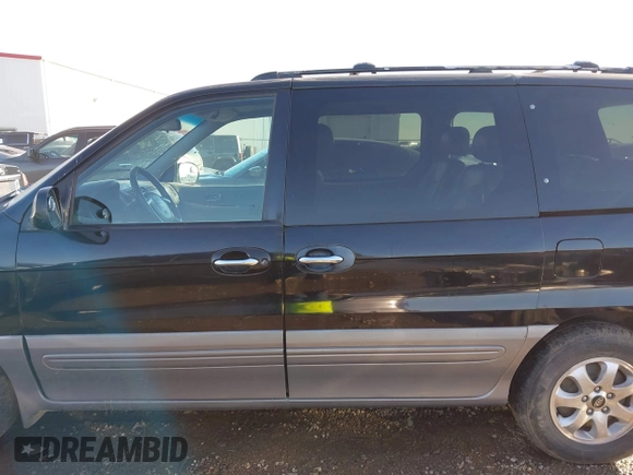 2004 Kia Sedona LX with VIN KNDUP131X46601278, listed as a IAAI auction lot 41472321 with 202,212 mi miles. Bid and sale history available at carsss.com. Image 15.