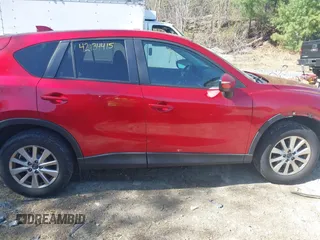 2015 Mazda CX-5 Touring with VIN JM3KE4CY1F0510361, listed as a IAAI auction lot 42134415 with 95,907 mi miles and . Bid and sale history available at carsss.com. Image 14.