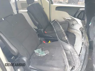 2017 Dodge Grand Caravan SE Plus z VIN 2C4RDGBG5HR780562, wystawiony jako IAAI lot #42066371 z przebiegiem Nie podano mil oraz . Historia ofert i sprzedaży dostępna na DreamBid. Obrazek 8.