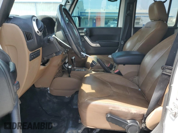 2015 Jeep Wrangler Unlimited Rubicon with VIN 1C4BJWFG8FL561308, listed as a Copart auction lot 60233385 with 208,224 mi miles and Clean title. Bid and sale history available at DreamBid. Image 7.