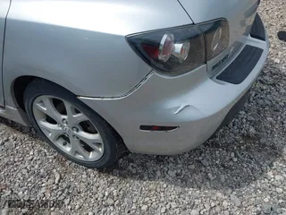 2009 Mazda Mazda3 s Touring with VIN JM1BK344591216032, listed as a IAAI auction lot 42005781 with 135,609 mi miles. Bid and sale history available at carsss.com. Image 6.